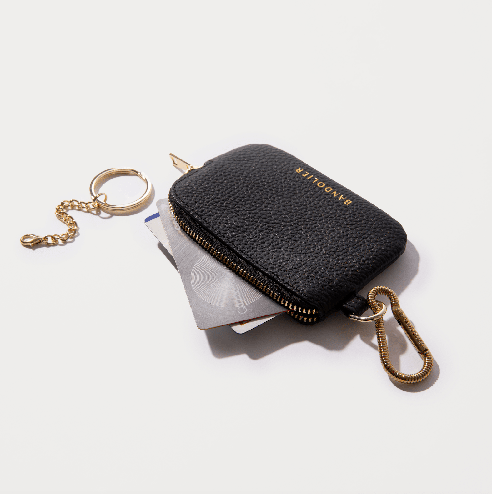 Zip key pouch outlet